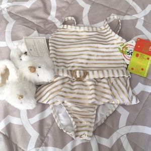 Baby girls bathing suit and unicorn slippers
